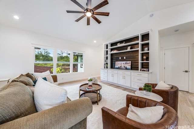 living area with a ceiling fan, light wood-style flooring, recessed lighting, and high vaulted ceiling