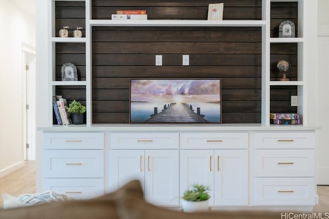 detailed view of wood finished floors and baseboards
