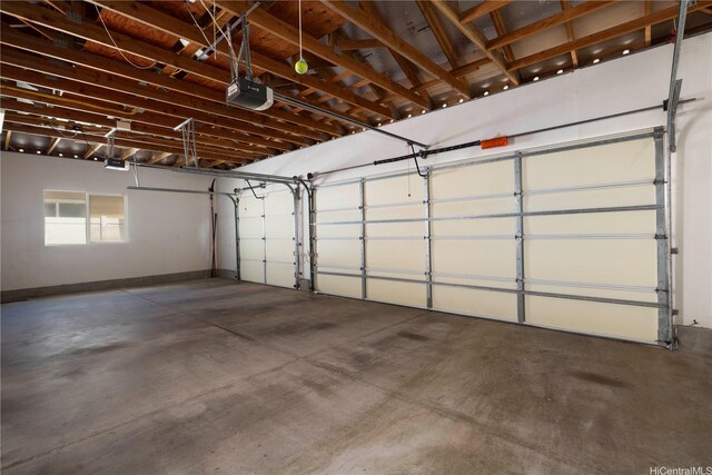 91-1104 Kaileonui St, Ewa Beach, HI 96706 - garage with a garage door opener and baseboards
