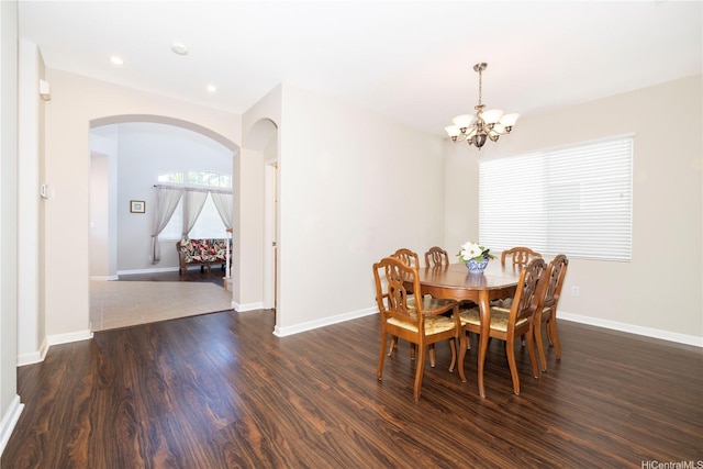 91-1104 Kaileonui St, Ewa Beach, HI 96706 - dining room with arched walkways, a chandelier, dark wood-style flooring, baseboards, and recessed lighting