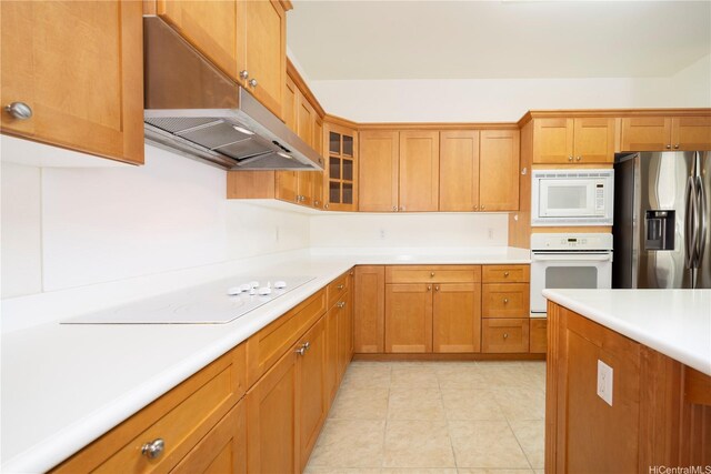 91-1104 Kaileonui St, Ewa Beach, HI 96706 - kitchen with white appliances, under cabinet range hood, light countertops, and glass insert cabinets