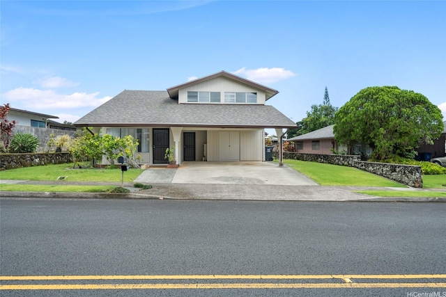 47-541 Hui Iwa St, Kaneohe, HI 96744 - view of front of house with a carport, asphalt driveway, a front yard, and a shingled roof