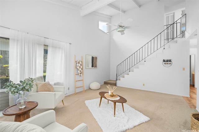 47-541 Hui Iwa St, Kaneohe, HI 96744 - living area featuring stairs, a high ceiling, beam ceiling, ceiling fan, and carpet floors