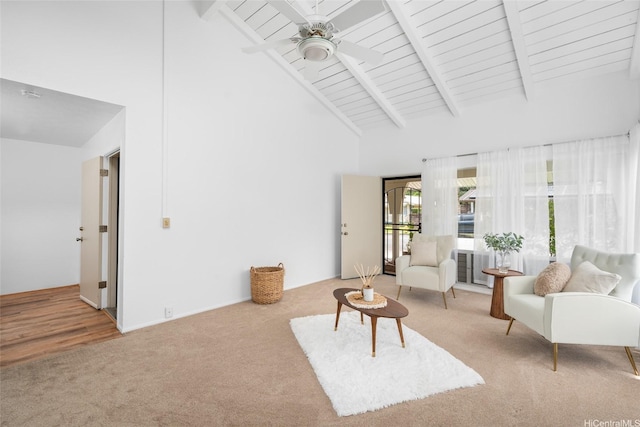 47-541 Hui Iwa St, Kaneohe, HI 96744 - living area featuring carpet, high vaulted ceiling, beam ceiling, a ceiling fan, and wooden ceiling