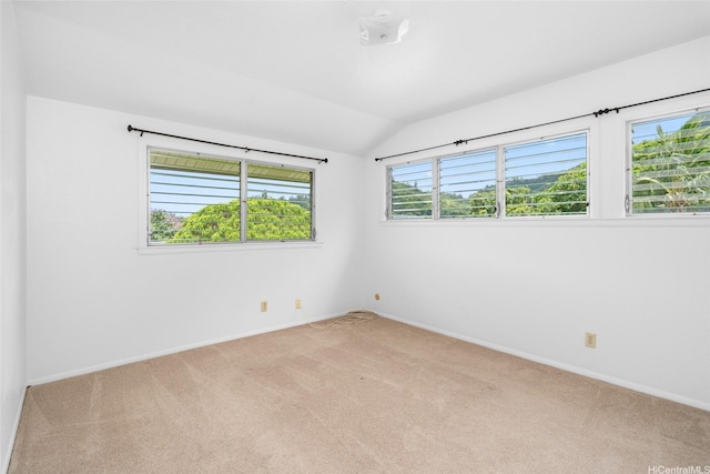 47-541 Hui Iwa St, Kaneohe, HI 96744 - spare room with carpet flooring, vaulted ceiling, and baseboards