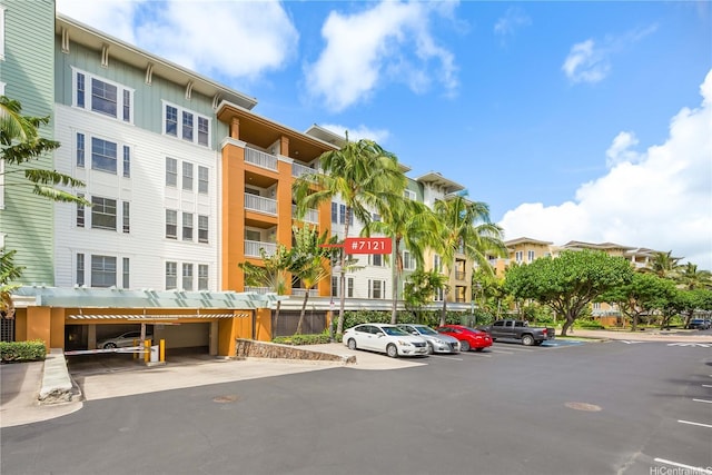 520 Lunalilo Home Rd Unit 7121, Honolulu, HI 96825 - view of apartment building / complex featuring uncovered parking