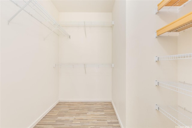 520 Lunalilo Home Rd Unit 7121, Honolulu, HI 96825 - walk in closet with light wood-style flooring