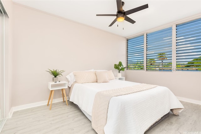 94-249 Waikele Rd Unit A205, Waipahu, HI 96797 - bedroom featuring light wood-style floors, baseboards, and a ceiling fan