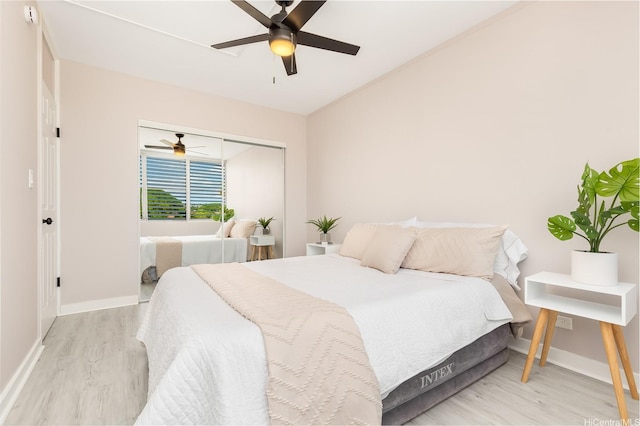 94-249 Waikele Rd Unit A205, Waipahu, HI 96797 - bedroom featuring wood finished floors, baseboards, a closet, and a ceiling fan