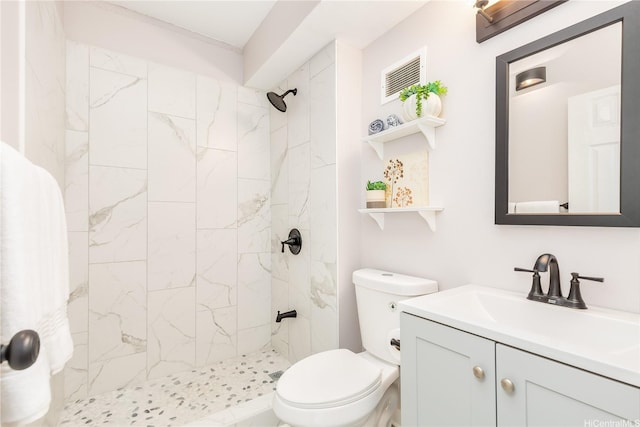 94-249 Waikele Rd Unit A205, Waipahu, HI 96797 - bathroom featuring a tile shower, toilet, and vanity