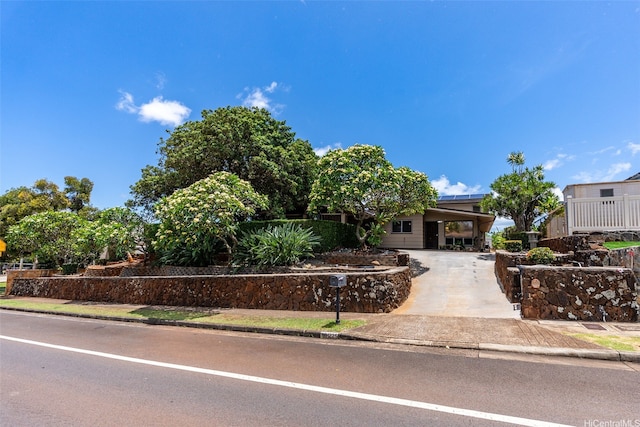 98-1225 Ulune St, Aiea, HI 96701 - obstructed view of property featuring driveway and a carport