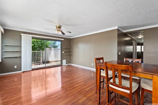 98-1225 Ulune St, Aiea, HI 96701 - dining space featuring ornamental molding, a ceiling fan, a textured ceiling, wood finished floors, and baseboards