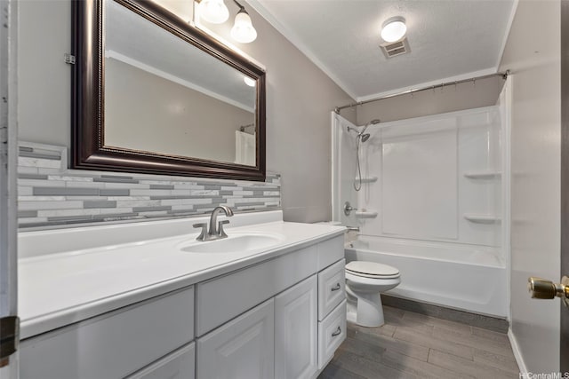 98-1225 Ulune St, Aiea, HI 96701 - bathroom featuring vanity, backsplash, toilet, wood finished floors, and shower / bath combo