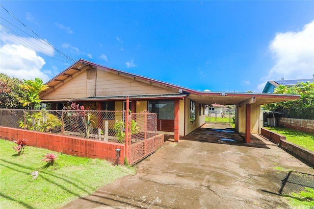 1313 Whitmore Ave, Wahiawa, HI 96786 - view of front of home featuring a carport and driveway