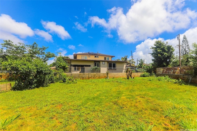 1313 Whitmore Ave, Wahiawa, HI 96786 - rear view of property with roof mounted solar panels