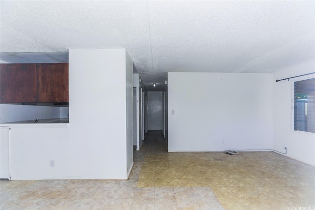 1313 Whitmore Ave, Wahiawa, HI 96786 - unfurnished room with a textured ceiling