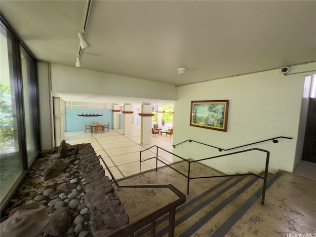 425 Ena Rd Unit 1201B, Honolulu, HI 96815 - corridor featuring track lighting and plenty of natural light