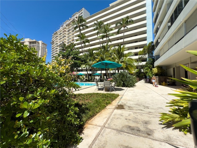 425 Ena Rd Unit 1201B, Honolulu, HI 96815 - view of home's community featuring a patio area and a pool