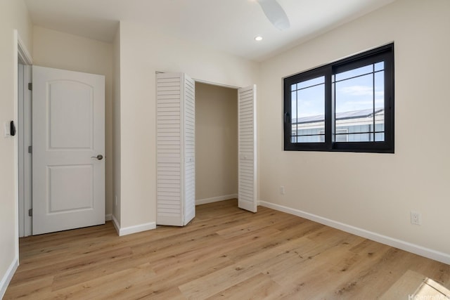 332 Iolani Ave, Honolulu, HI 96813 - unfurnished bedroom featuring baseboards, light wood-style floors, a closet, and recessed lighting