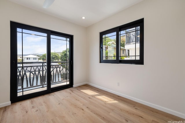 332 Iolani Ave, Honolulu, HI 96813 - spare room featuring baseboards, wood finished floors, and recessed lighting