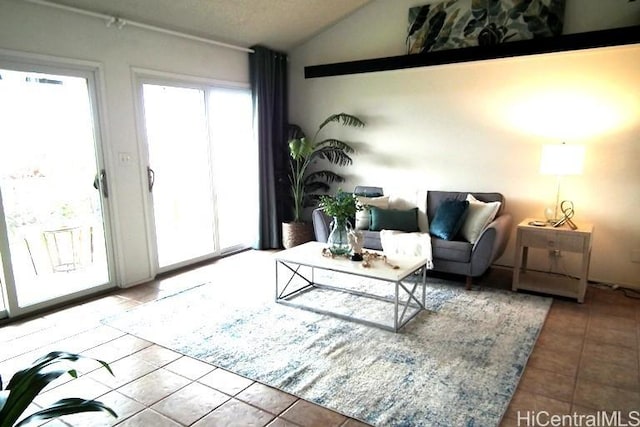 98-487 Kipaepae St Unit 116, Aiea, HI 96701 - living room with tile patterned floors and vaulted ceiling