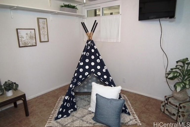98-487 Kipaepae St Unit 116, Aiea, HI 96701 - recreation room with tile patterned flooring and baseboards