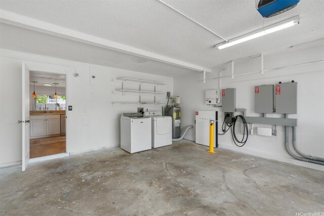 549 Keolu Dr Unit C, Kailua, HI 96734 - garage with separate washer and dryer, water heater, a sink, and a garage door opener