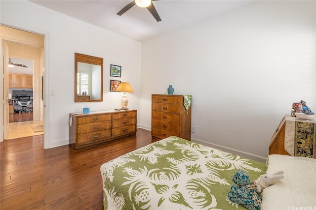 91-1338 Kaiokia St, Ewa Beach, HI 96706 - bedroom with dark wood-style flooring, a ceiling fan, and a desk