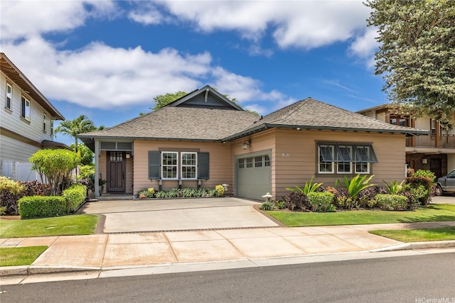 91-1338 Kaiokia St, Ewa Beach, HI 96706 - view of front of property featuring an attached garage, a shingled roof, driveway, and a front lawn