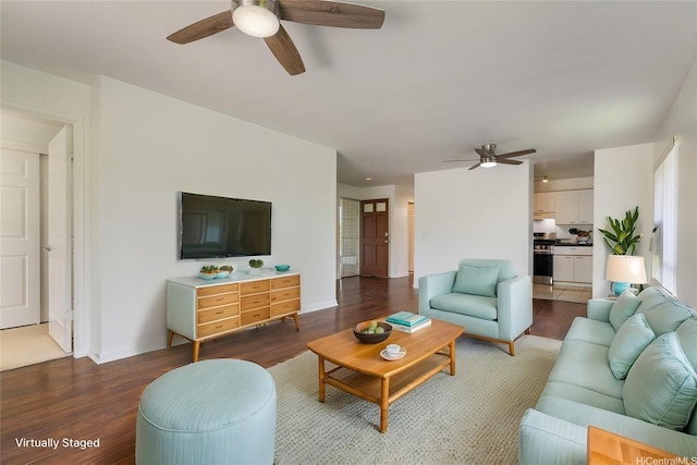 91-1058 Kekuilani Loop Unit 1605, Kapolei, HI 96707 - living room featuring a ceiling fan, wood finished floors, and baseboards