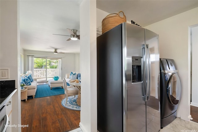 91-1058 Kekuilani Loop Unit 1605, Kapolei, HI 96707 - kitchen with stainless steel fridge, washer / dryer, ceiling fan, open floor plan, and wood finished floors