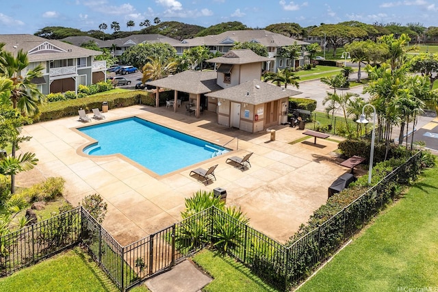 91-1058 Kekuilani Loop Unit 1605, Kapolei, HI 96707 - view of swimming pool with fence, a patio area, and a residential view
