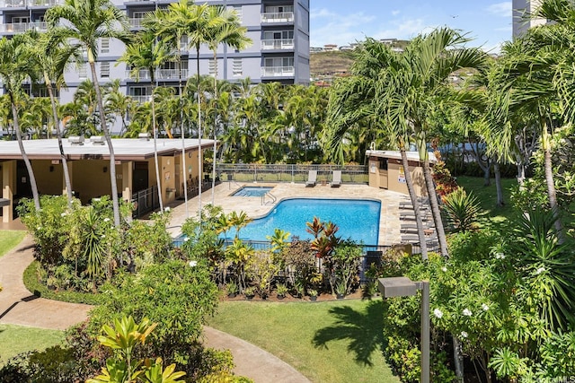 5070 Likini St Unit 1409, Honolulu, HI 96818 - community pool featuring fence, a community hot tub, and a patio