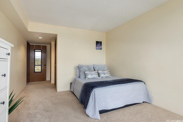 5070 Likini St Unit 1409, Honolulu, HI 96818 - bedroom featuring light colored carpet