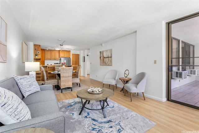 3138 Waialae Ave Unit 521, Honolulu, HI 96816 - living area with light wood-style flooring and baseboards