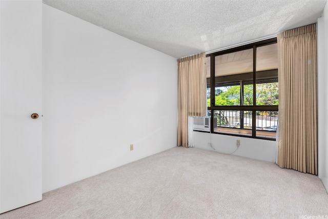 3138 Waialae Ave Unit 521, Honolulu, HI 96816 - carpeted empty room with a textured ceiling and cooling unit