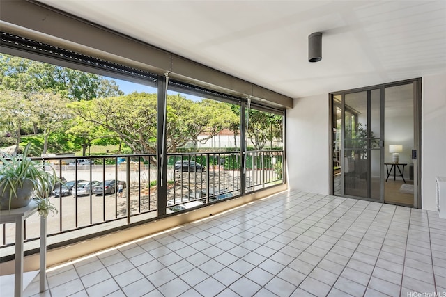 3138 Waialae Ave Unit 521, Honolulu, HI 96816 - unfurnished sunroom with tile patterned flooring
