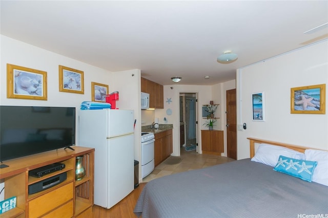 1700 Ala Moana Blvd Unit 1601, Honolulu, HI 96815 - bedroom featuring freestanding refrigerator
