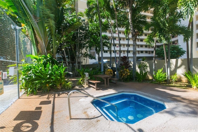 1700 Ala Moana Blvd Unit 1601, Honolulu, HI 96815 - view of swimming pool featuring a community hot tub, fence, and a patio