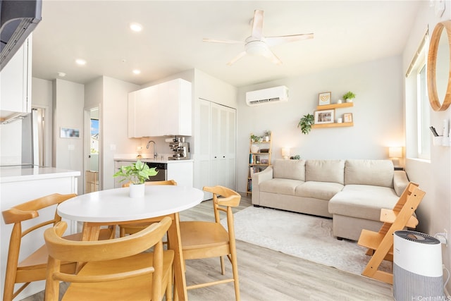 91-3575 Kamolehonua St Unit 1413, Ewa Beach, HI 96706 - dining space featuring a wall mounted AC, light wood finished floors, a ceiling fan, and recessed lighting