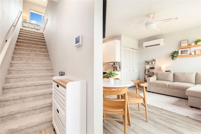 91-3575 Kamolehonua St Unit 1413, Ewa Beach, HI 96706 - stairs featuring a wall mounted AC, wood finished floors, and a ceiling fan