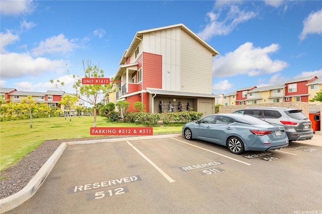 91-3575 Kamolehonua St Unit 1413, Ewa Beach, HI 96706 - uncovered parking lot with a residential view