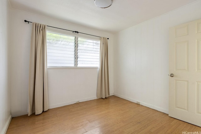 54-011 Waikulama St, Hauula, HI 96717 - spare room featuring light wood-style flooring and baseboards