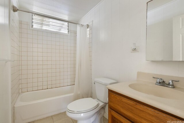 54-011 Waikulama St, Hauula, HI 96717 - bathroom featuring vanity, shower / bath combo, tile patterned floors, and a textured ceiling