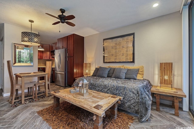 51-636 Kamehameha Hwy Unit 215, Kaaawa, HI 96730 - bedroom featuring freestanding refrigerator, baseboards, and recessed lighting