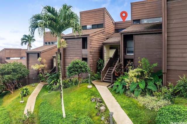 51-636 Kamehameha Hwy Unit 215, Kaaawa, HI 96730 - view of building exterior featuring stairway