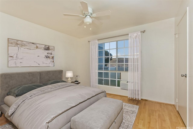 92-1045 Lalahi St Unit 102, Kapolei, HI 96707 - bedroom featuring light wood-style flooring and a ceiling fan