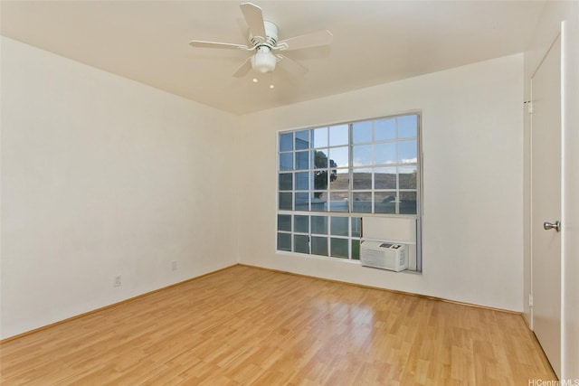 92-1045 Lalahi St Unit 102, Kapolei, HI 96707 - unfurnished room with light wood-type flooring, ceiling fan, cooling unit, and baseboards