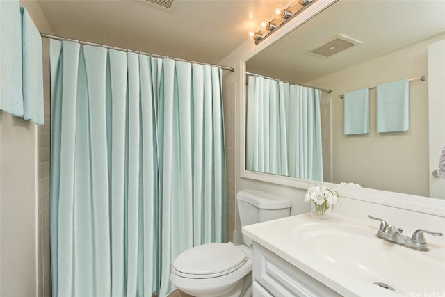 92-1045 Lalahi St Unit 102, Kapolei, HI 96707 - bathroom featuring vanity, toilet, and curtained shower