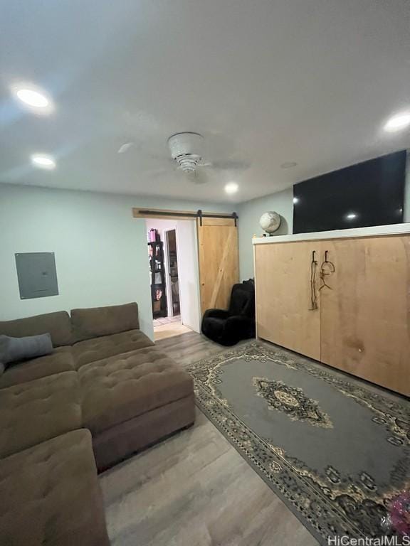 94-1436 Lanikuhana Ave Unit 467, Mililani, HI 96789 - living room featuring a barn door, light wood-type flooring, electric panel, and recessed lighting